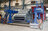 Tamiseur à barres vibrantes dans un hall de production | © Allgaier Process Technology 2022