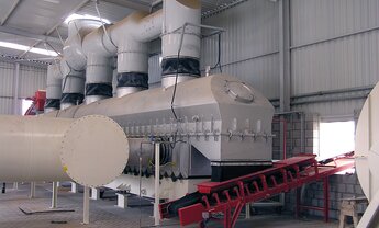 sistema de secado de lecho fluidizado en la nave de producción | © Allgaier Process Technology 2023
